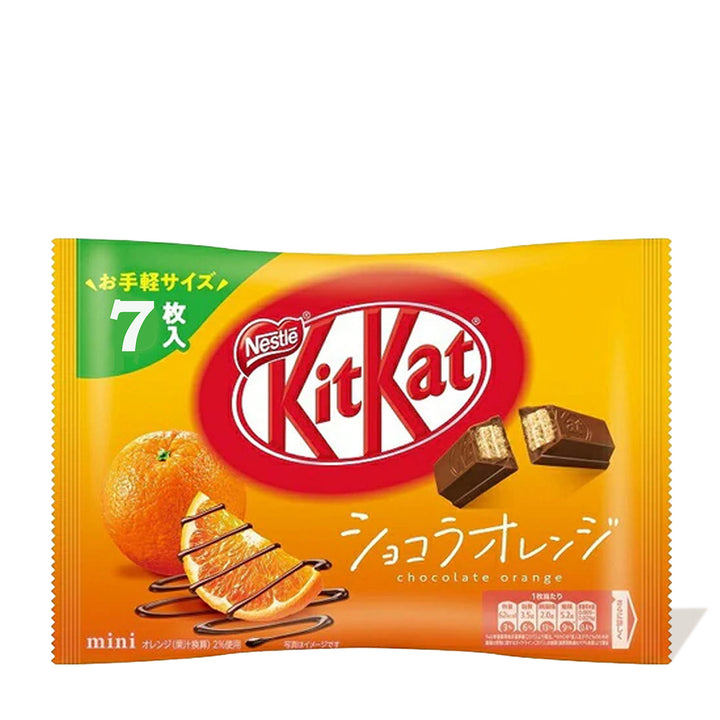 Packaging of Nestle Japan's Japanese Kit Kat: Chocolate & Ehime Iyokan Orange, displaying the logo, an orange slice, and seven mini chocolate bars. Text in Japanese indicates variety.