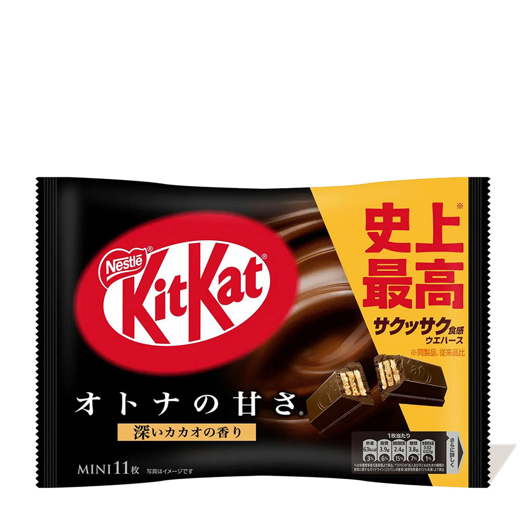 A package of Nestle Japan's Japanese Kit Kat dark chocolate with a distinct molasses flavor, labeled in both Japanese and English, featuring an image of the candy on a dark background.