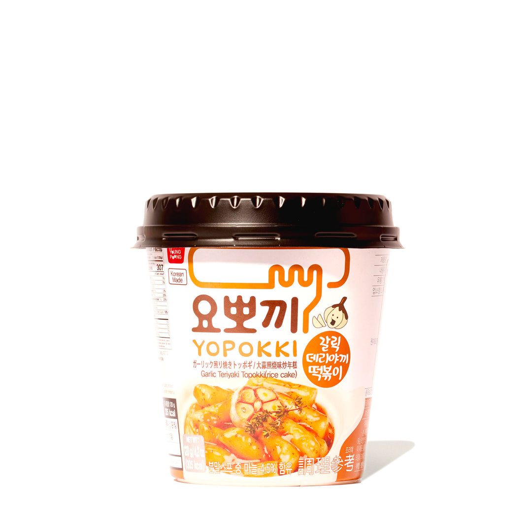 A cup of Yopokki Instant Tteokbokki Rice Cake Cup: Garlic Teriyaki 6 Pack on a white background.