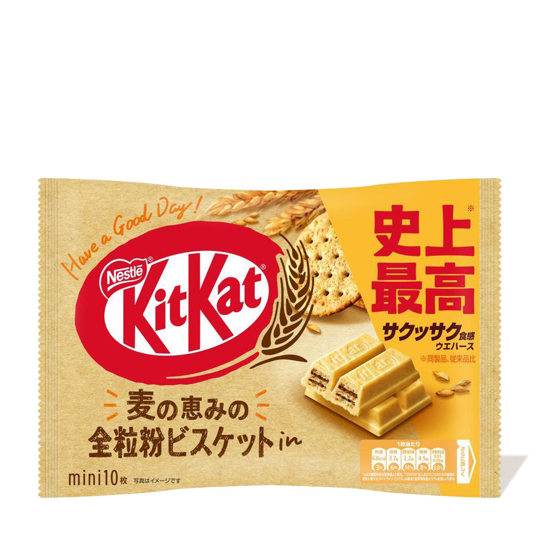 Packaging of Nestle Japan's Japanese Kit Kat: Whole Wheat Cookie featuring a sesame seed flavor, displayed with whole wheat biscuits, both whole and partially unwrapped, on a golden background with Japanese text.