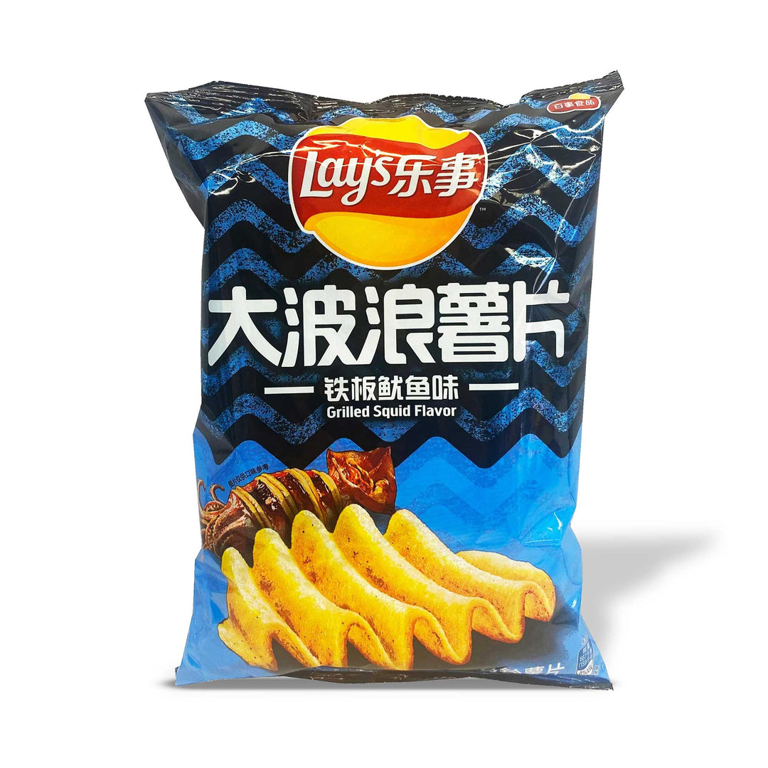 A bag of Lay's Wavy Potato Chips: Grilled Squid Calamari with chinese writing on it.