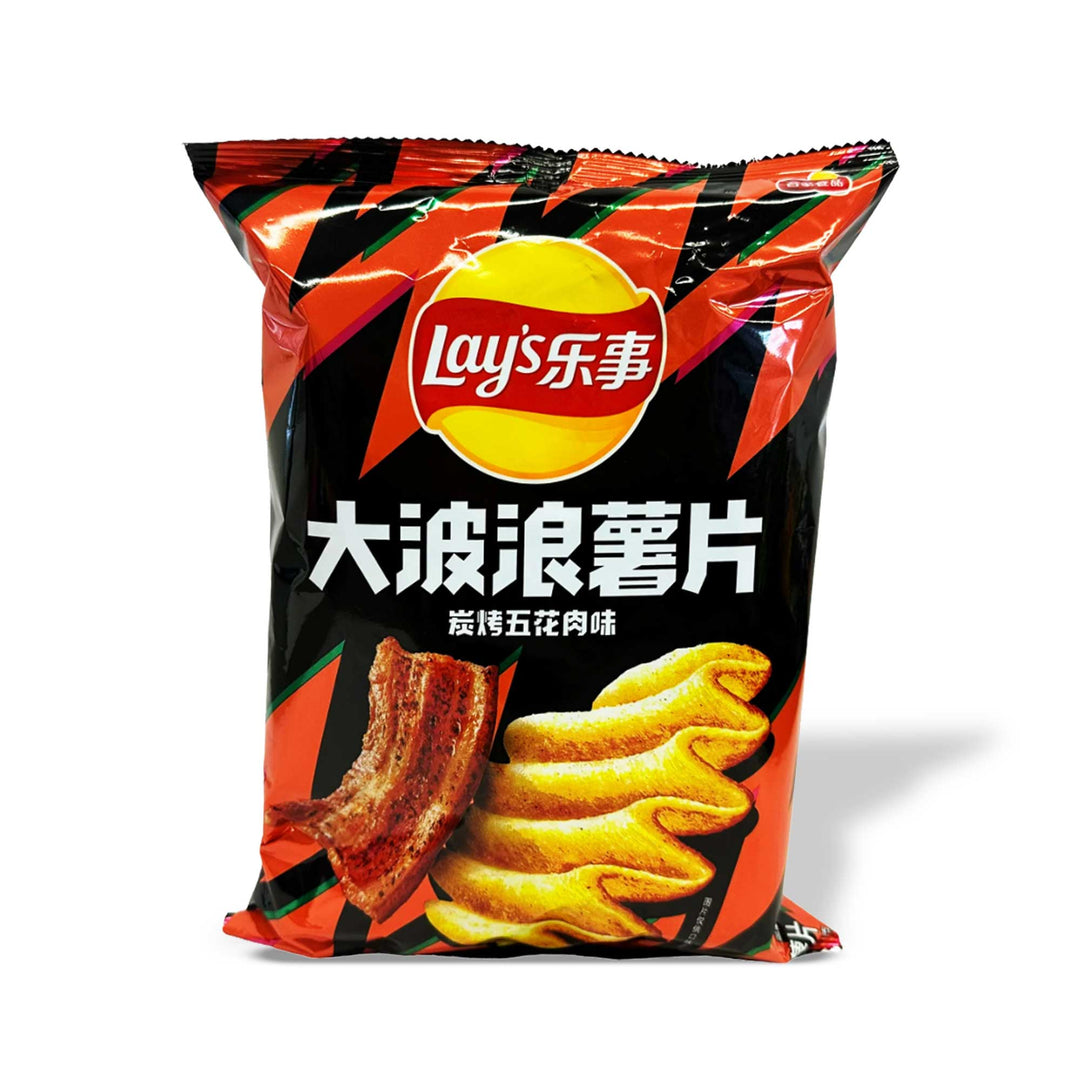 A bag of Lay's Wavy Chips: Grilled Pork Belly on a white background.