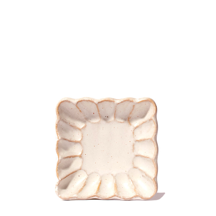A small Kikka Kobiki Ivory Square Dish with a floral design on it. (Brand: MTC)