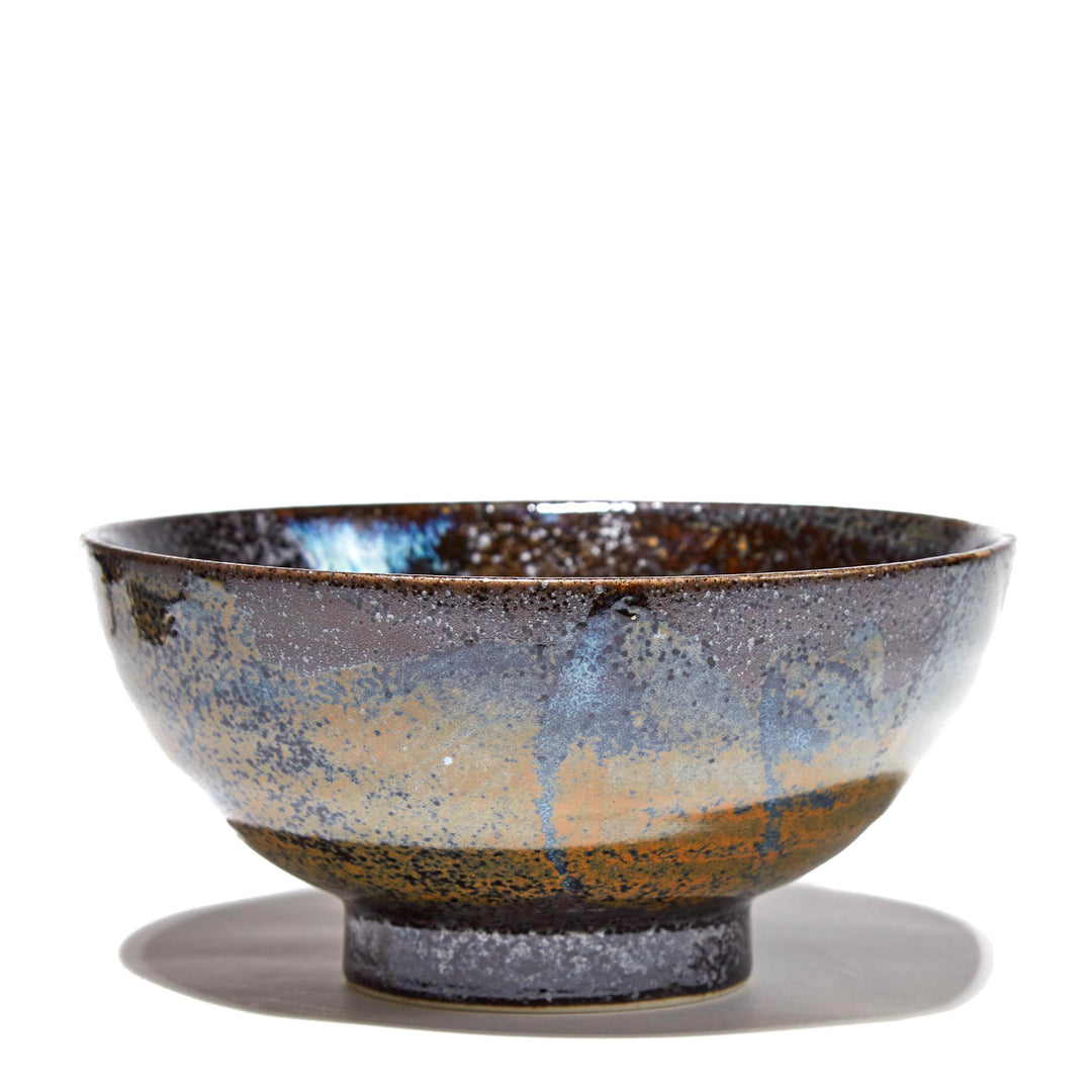 A MTC Cobalt Hazed Noodle Bowl with a blue and brown glaze.
