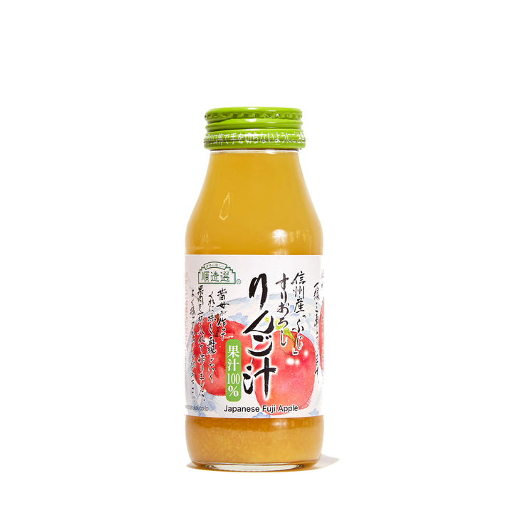 A bottle of Junzosen Surioroshi Fuji Apple Juice on a white background.