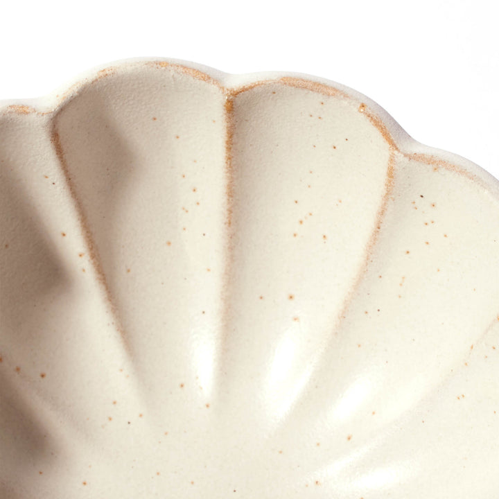 A close up of a Kikka Daisy Kobiki Ivory Kobachi Bowl by MTC on a white surface.