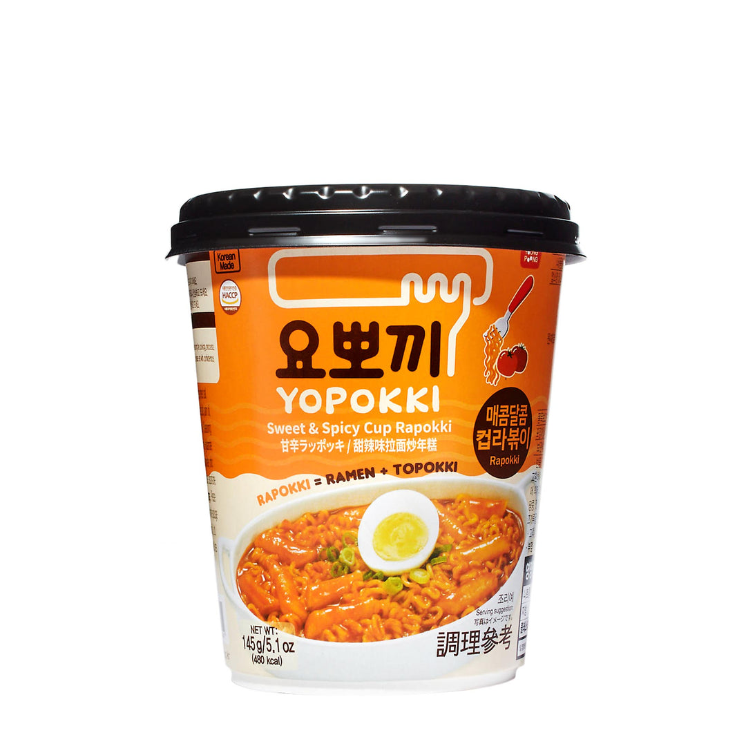 A cup of Yopokki Instant Rabokki Ramen and Tteokbokki Rice Cake Cup: Original Sweet & Spicy on a white background.