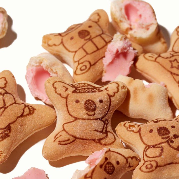 Lotte brand Lotte Koala's March: Strawberry-shaped biscuits with koala faces on them.