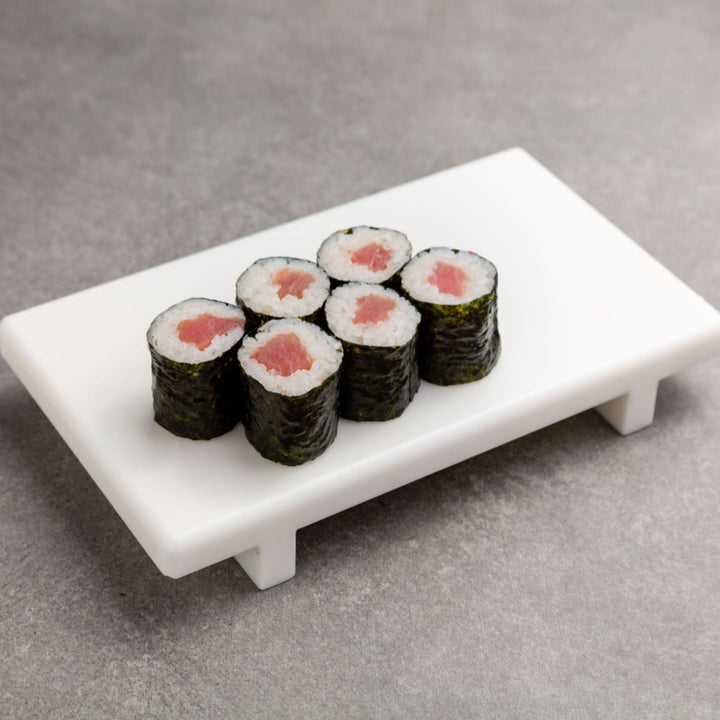 Sashimi-Grade Yellowfin Tuna (1 lb) by Sea Delight on a white tray on a grey background.
