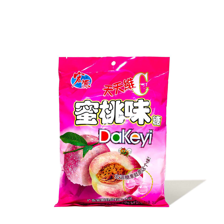 A bag of Hongyuan Peach Candy with Chinese writing on it.