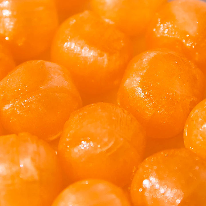A close up of Hongyuan Peach Candy in a bowl.