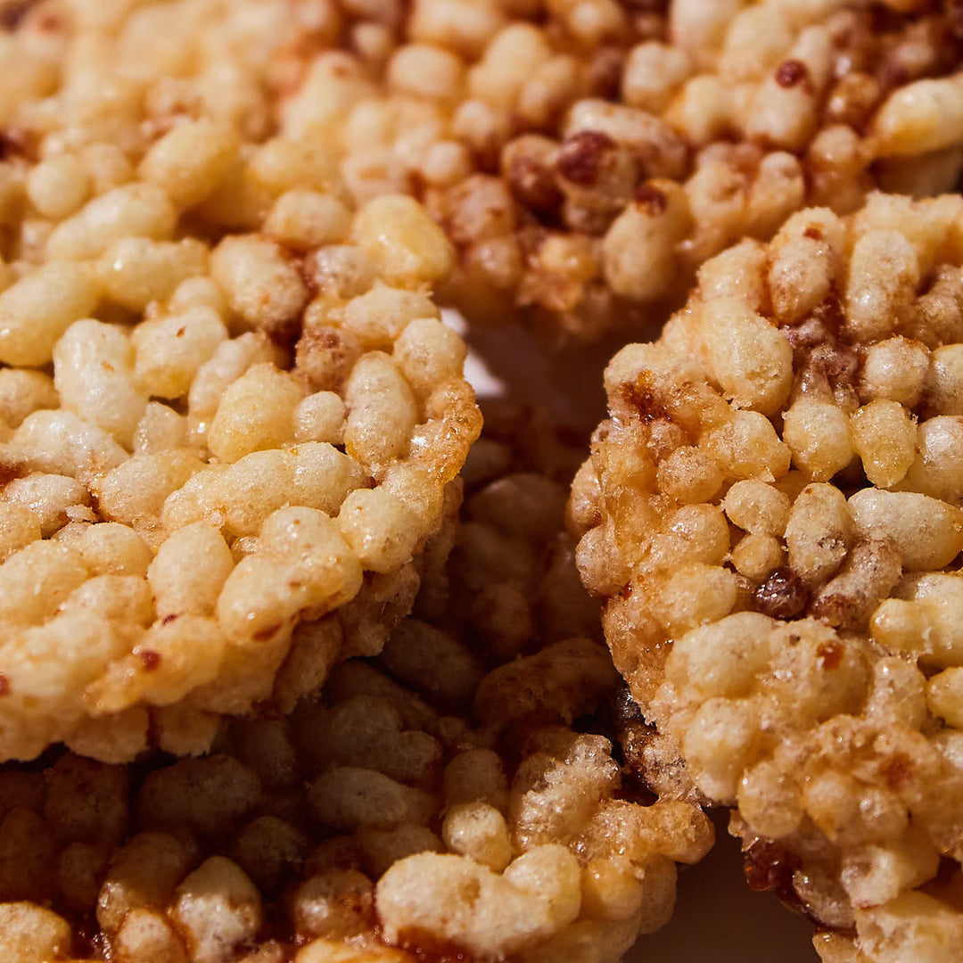 A close up of some Amanoya Rice Crackers: Roasted Soy Sauce treats.