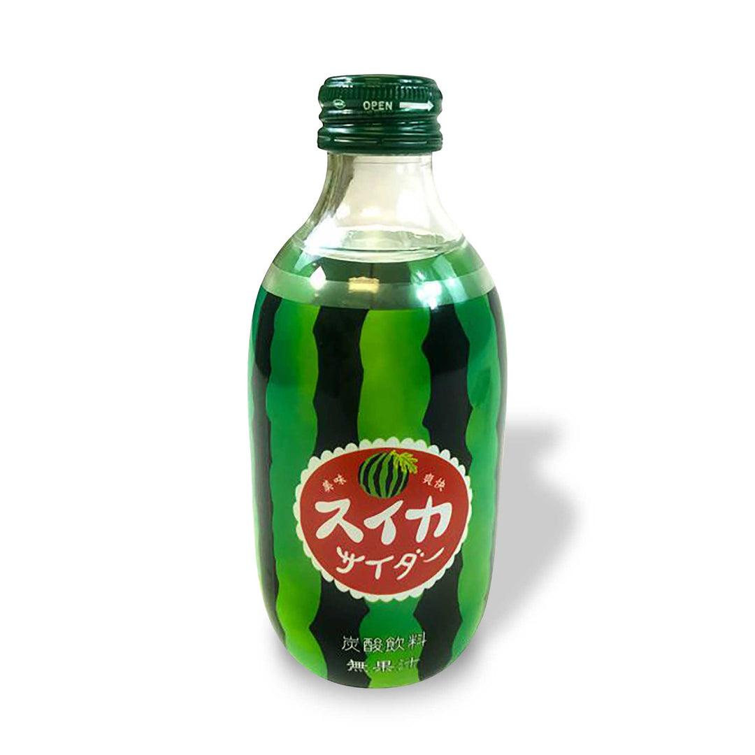 A bottle of Tomomasu Watermelon Sparkling Soda with Japanese writing on it.