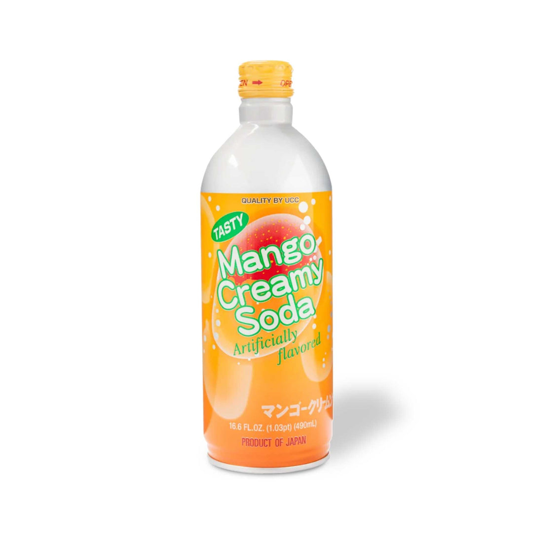 A bottle of UCC Mango Creamy Soda on a white background.