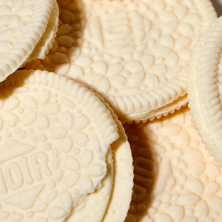 A close up of some YBC White Noir Chocolate Cookies by YBC Noir.