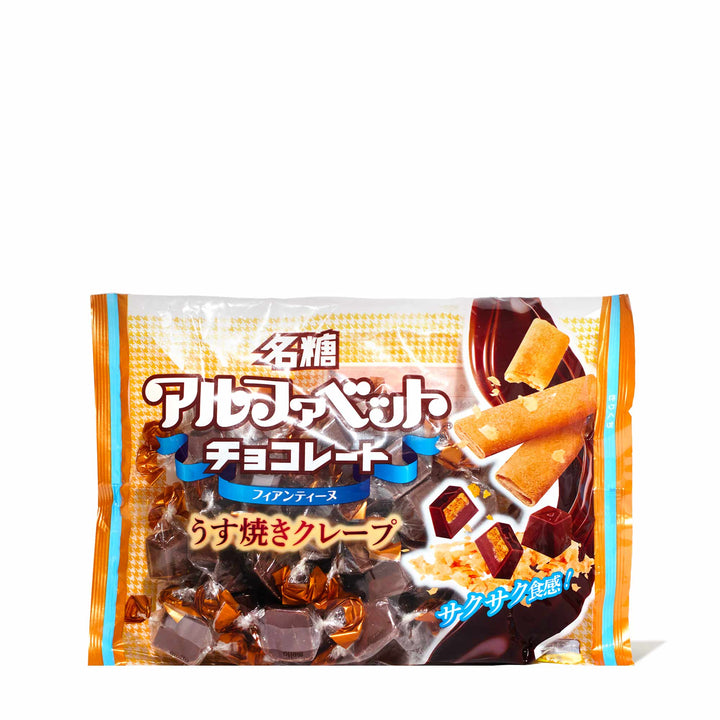 A bag of Meito Alphabet Chocolate Fantini Crepe candy with japanese writing on it.
