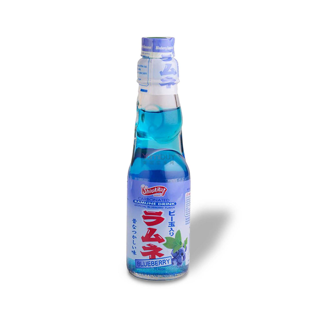 A Shirakiku Ramune Soda: Blueberry bottle on a white background.