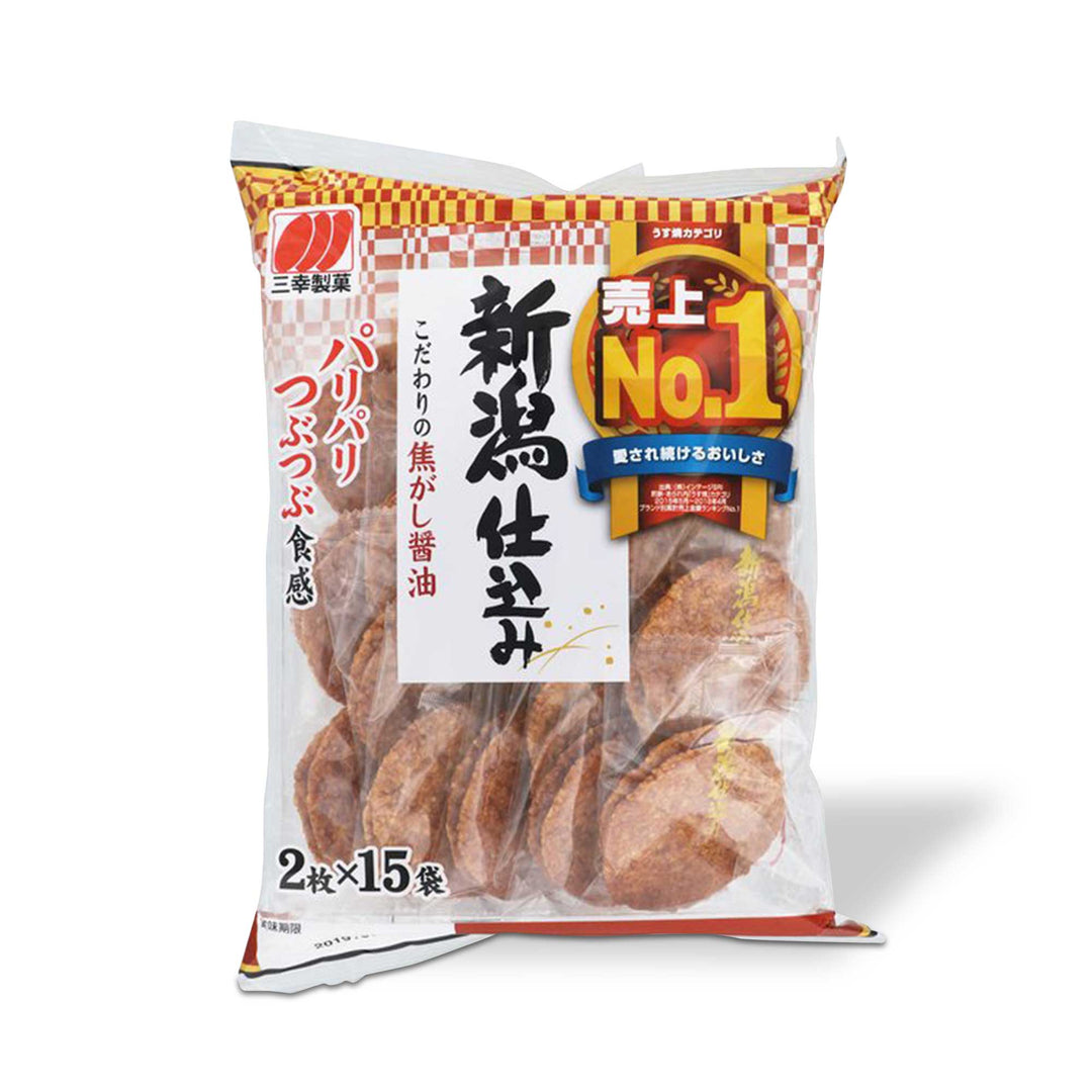 A bag of Sanko Niigata Style Rice Crackers (30 pieces) on a white background.