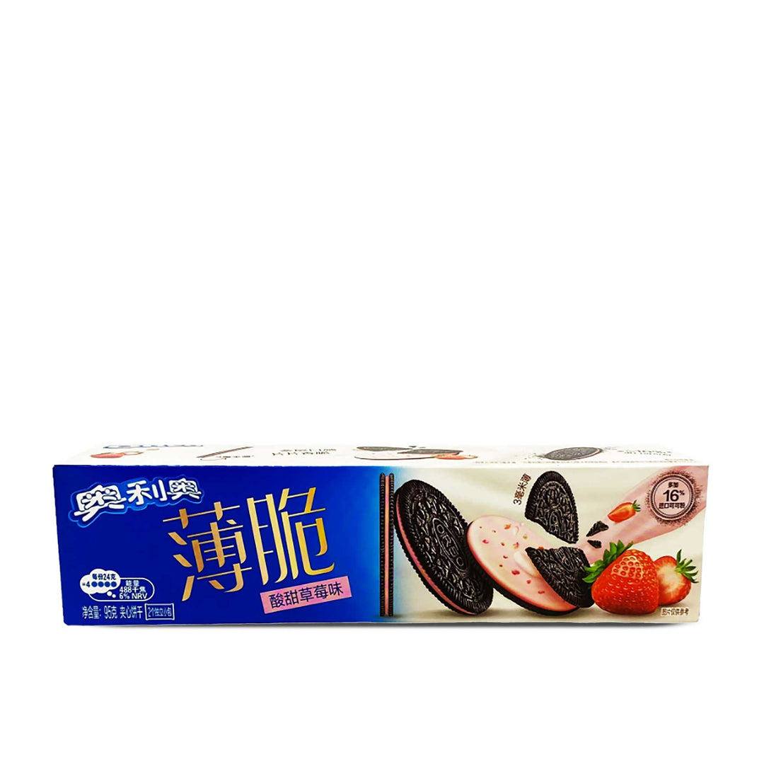 A box of Oreo Thin Cookies: Sweet & Sour Strawberry with strawberries in it.