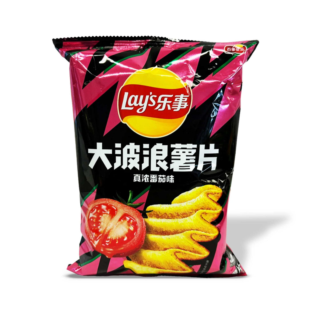 A bag of Lay's Wavy Chips: Pure Tomato with tomatoes on it.