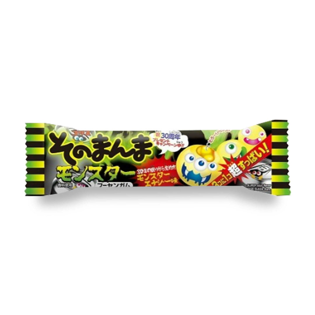 A Coris Monster Gum candy bar with a green and black design.