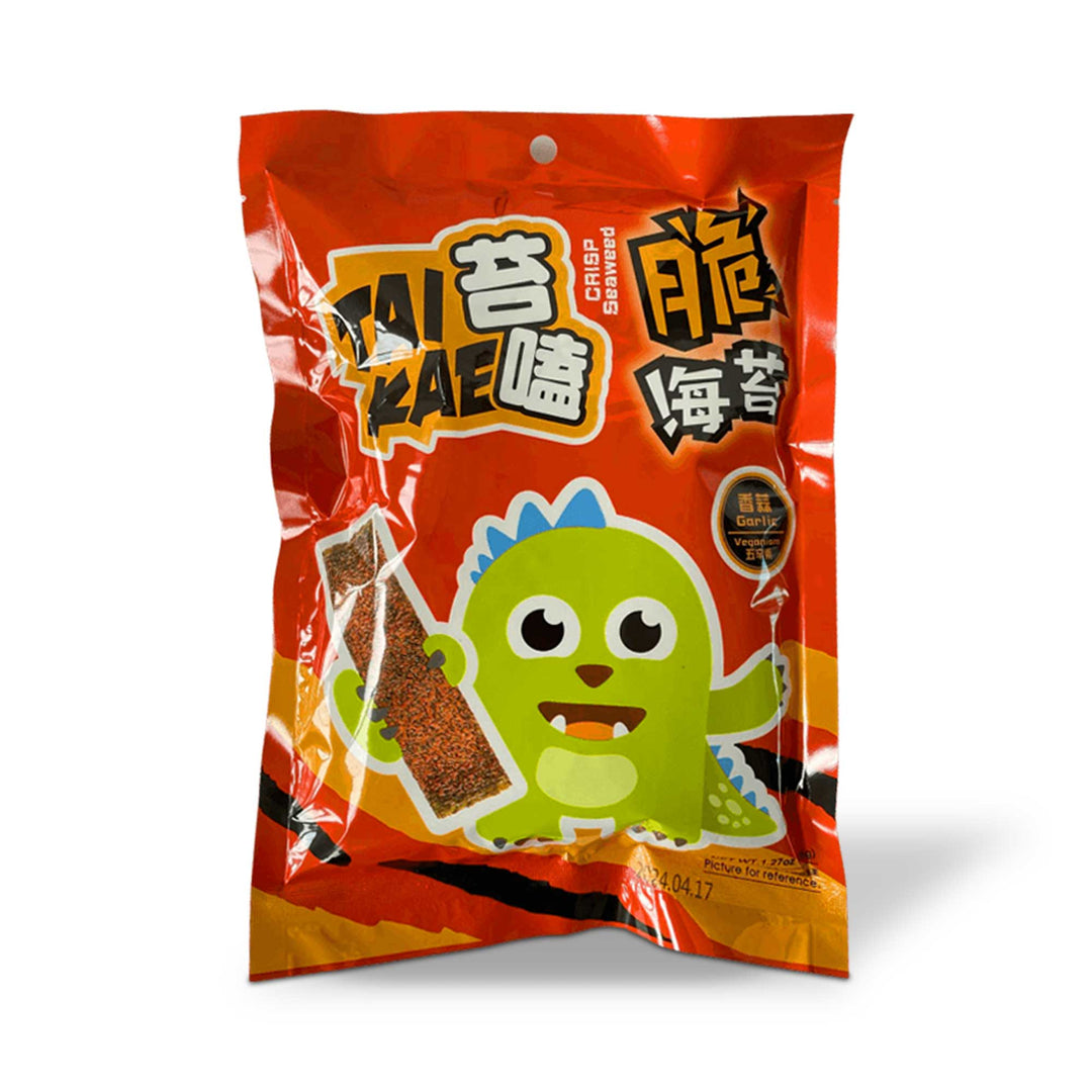 A bag of Tai Kae Crispy Seaweed Snack: Garlic with an orange monster on it.