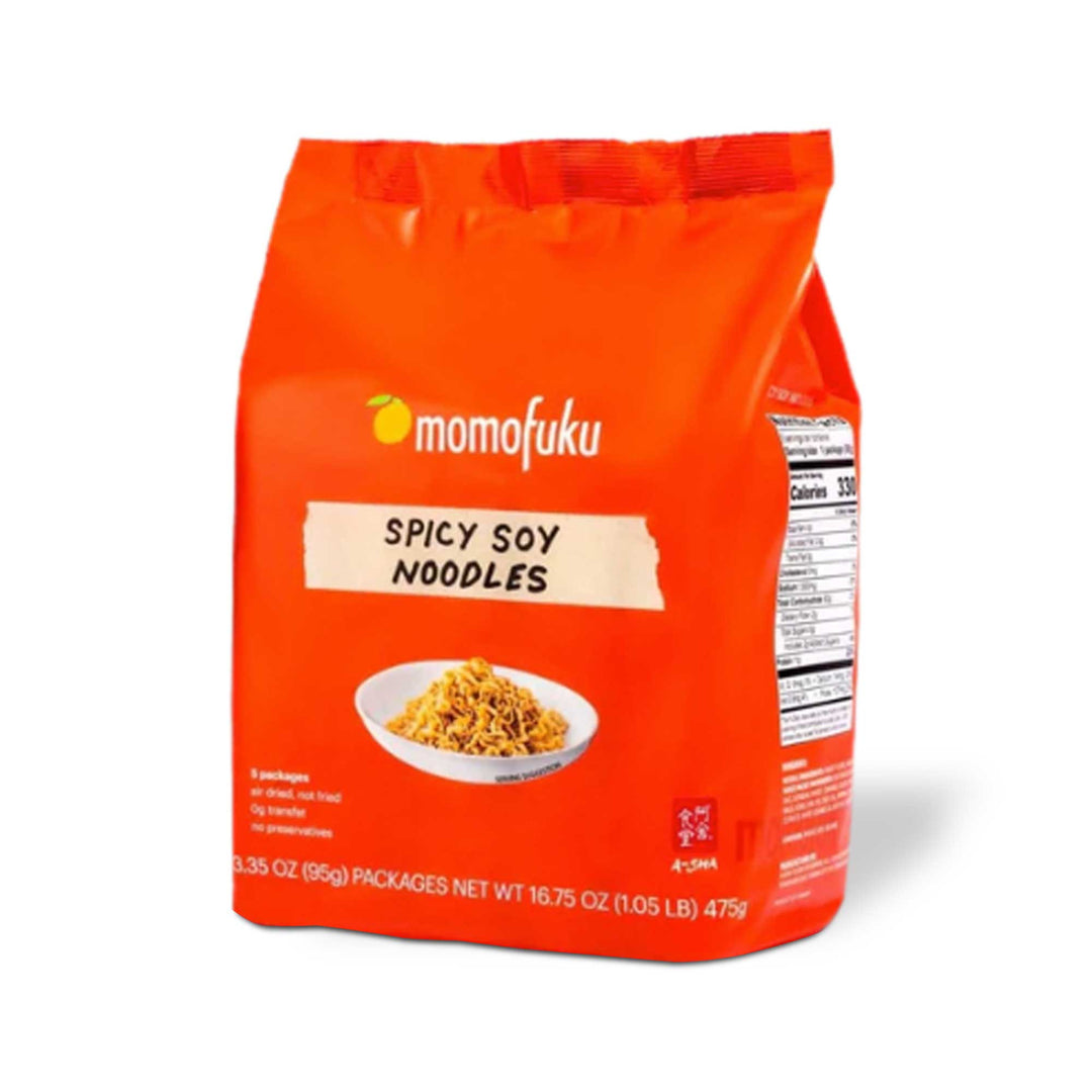 A bag of Momofuku x A-Sha Premium Instant Noodles: Spicy Soy (5-pack), on a white background.