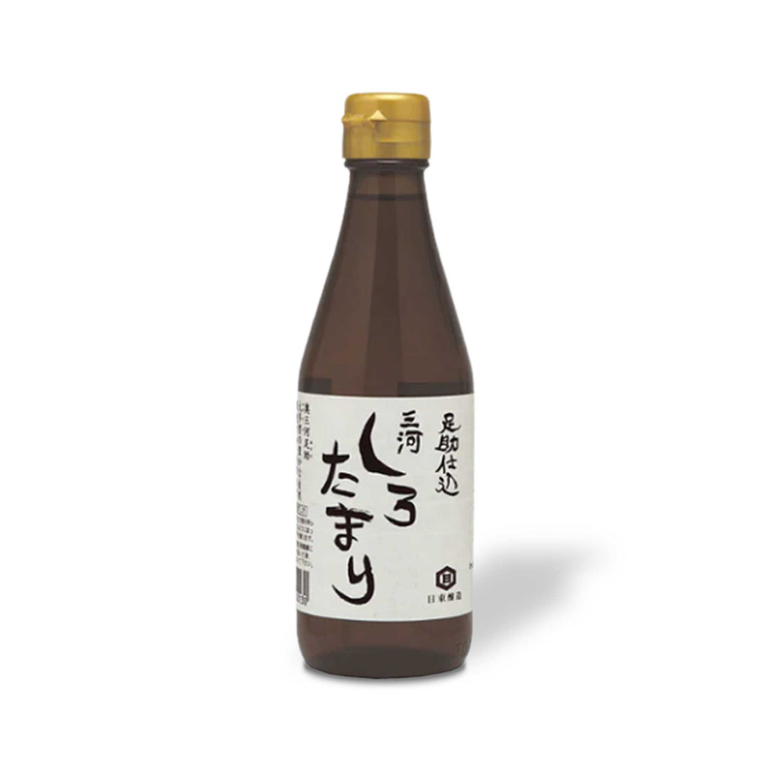 A bottle of Nitto Jozo's Mikawa Shiro Shoyu White Soy Sauce on a white background, showcasing the umami flavors.