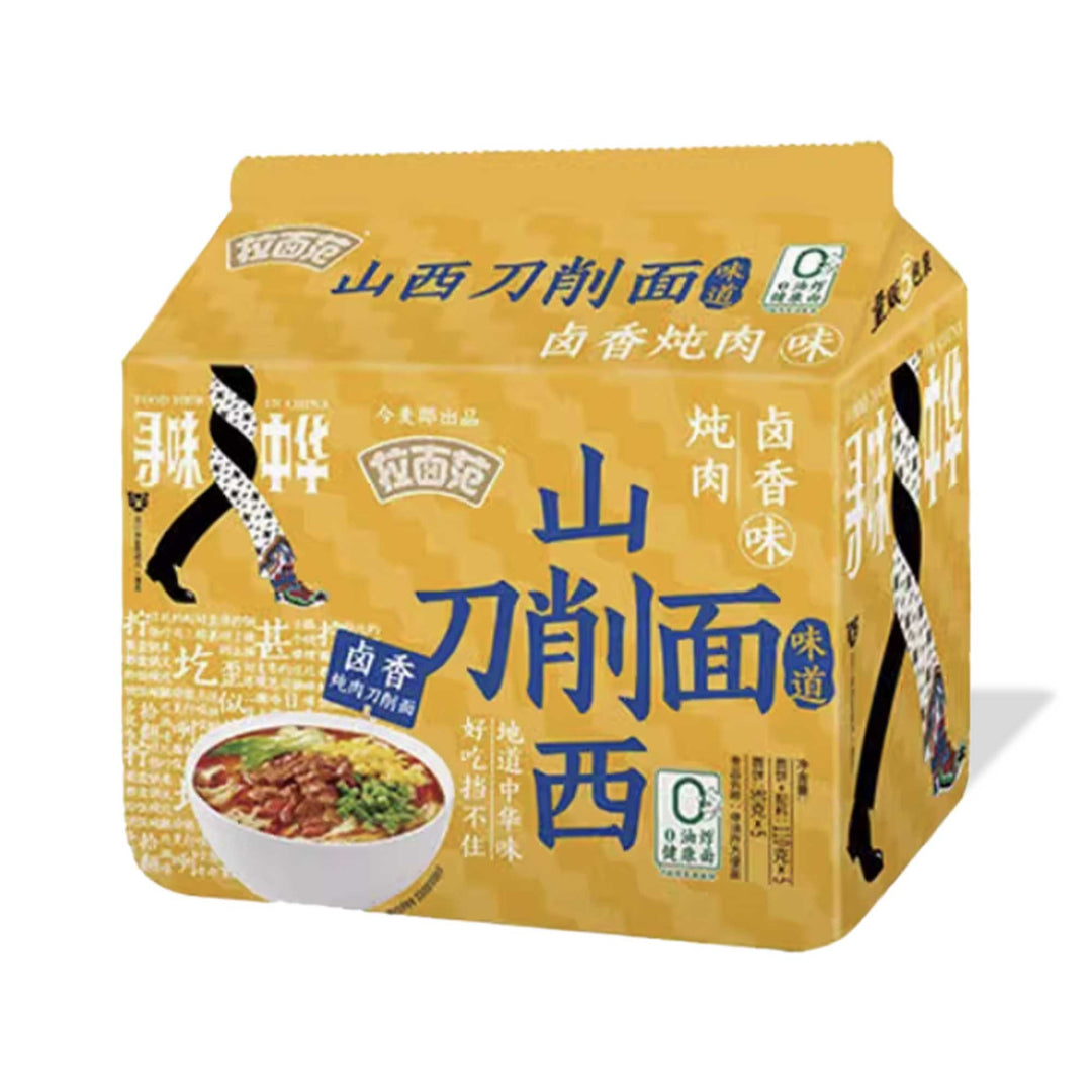 A box of JML Shanxi Knife-Cut Noodles with Chinese characters on it, in braised beef flavor.
