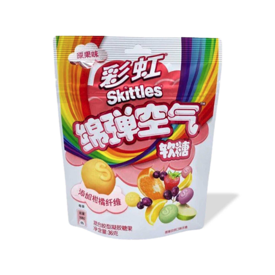 A bag of Skittles Gummies: Original Fruit Mix candy in a white background.