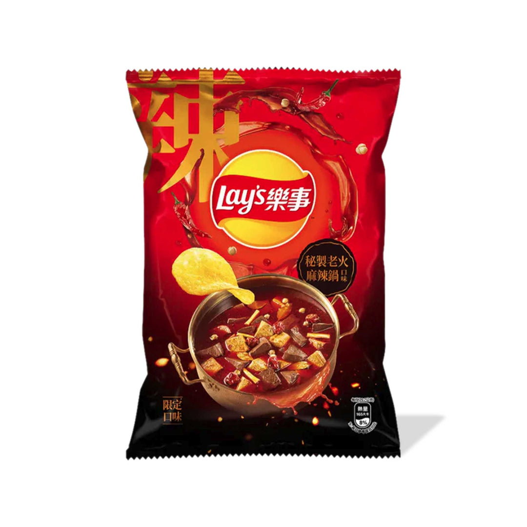 A bag of spicy Lay's Potato Chips with Chinese writing on it: A bag of spicy Lay's Potato Chips: Secret Spicy Pot with Chinese writing on it.