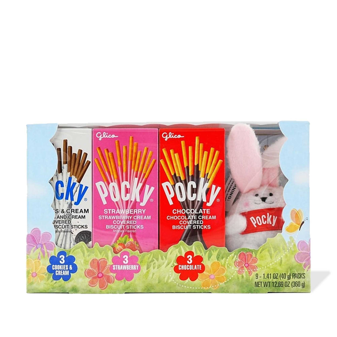 Variety pack of Glico Pocky Spring Gift Pack biscuit sticks in three flavors displayed in a box with a stuffed bunny keychain.