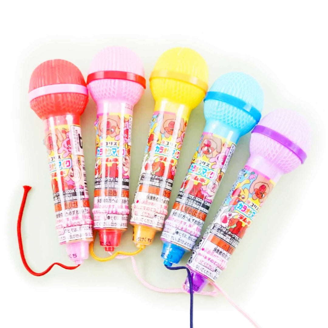 A group of colorful, Coris Ramune Candy Karaoke Microphones on a white background.