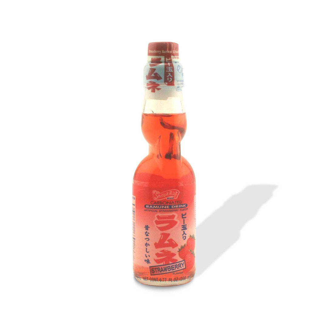 A bottle of Shirakiku Ramune Soda: Strawberry on a white background.
