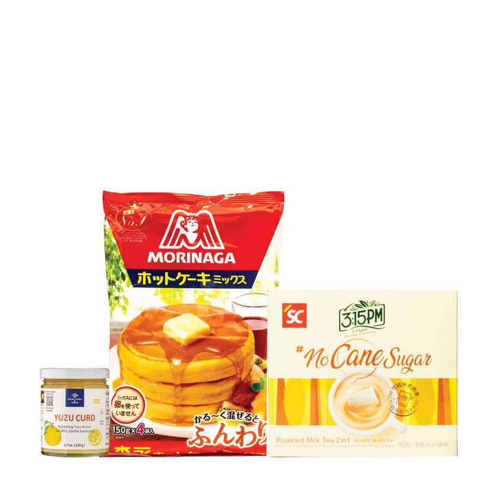 A package of Bokksu Market Japanese Pancake Breakfast Kit, a bag of sugar, and a jar of honey.