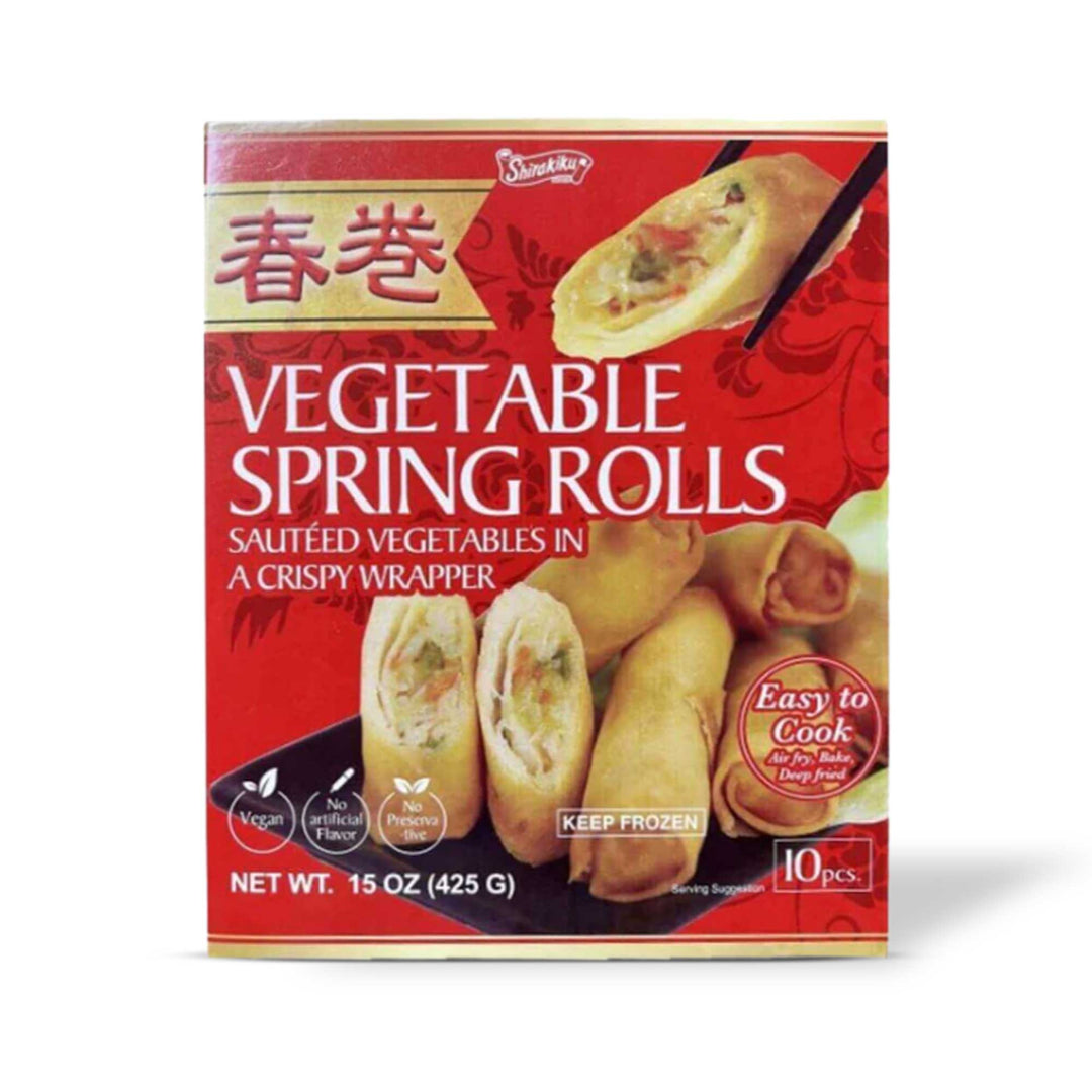 A box of Shirakiku crunchy vegetable spring rolls with vermicelli and veggie mix, served on a white background.
