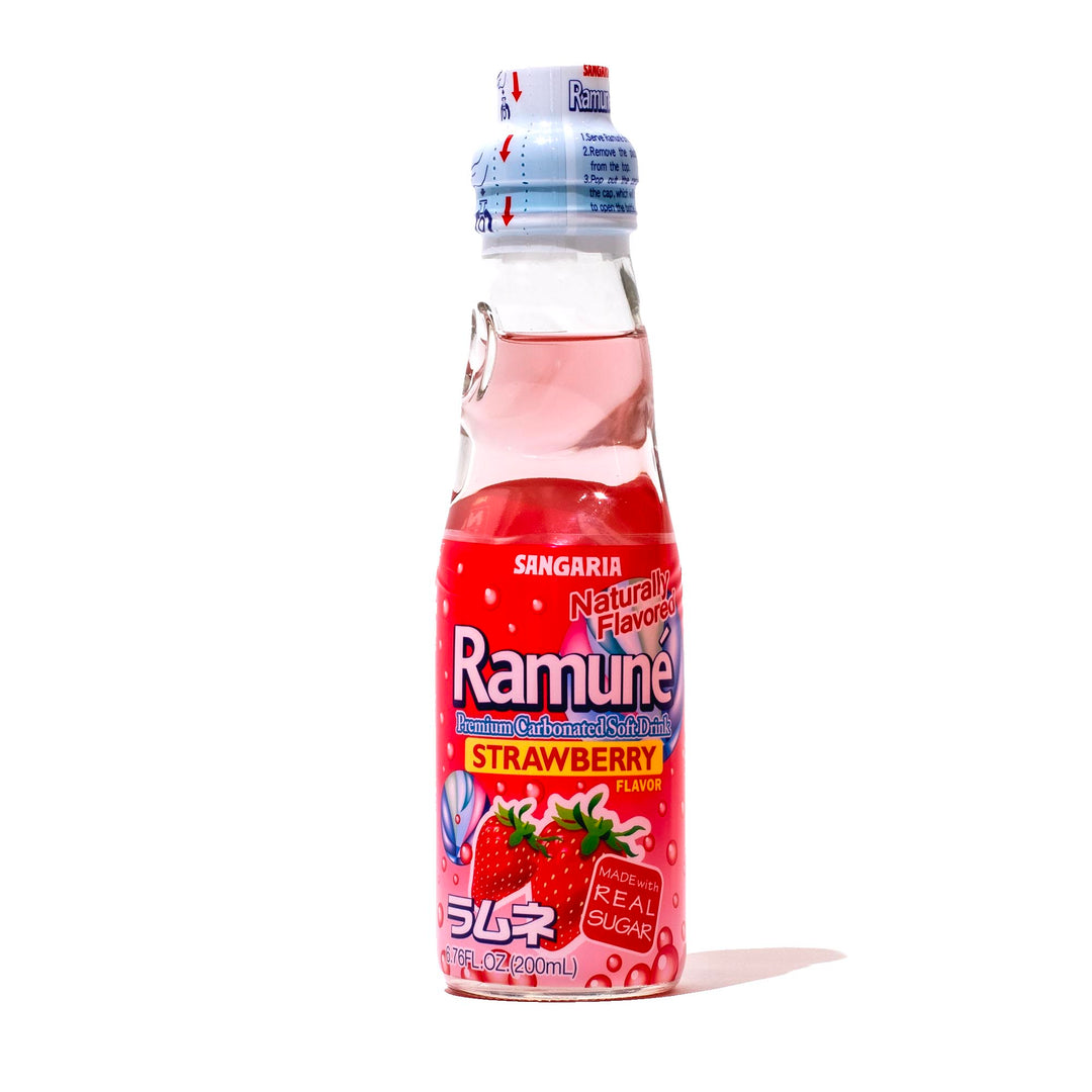 A bottle of Sangaria Ramune Soda: Strawberry on a white background.