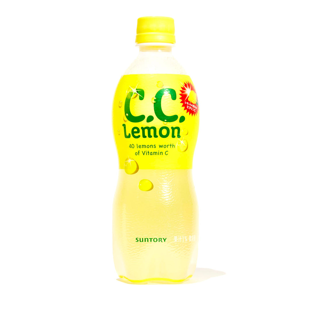 A bottle of Suntory C.C. Lemon drink on a white background.