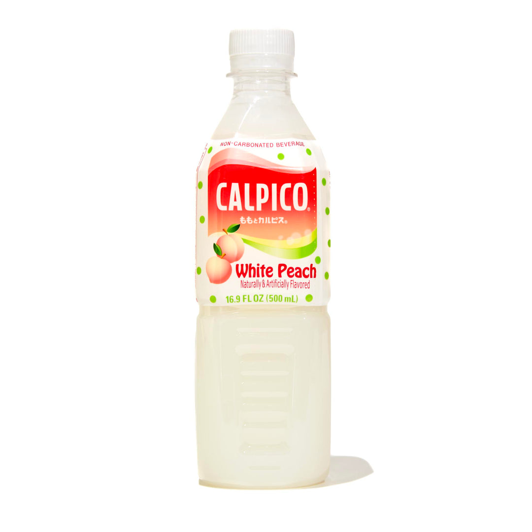 A bottle of Asahi Calpico: White Peach on a white background.