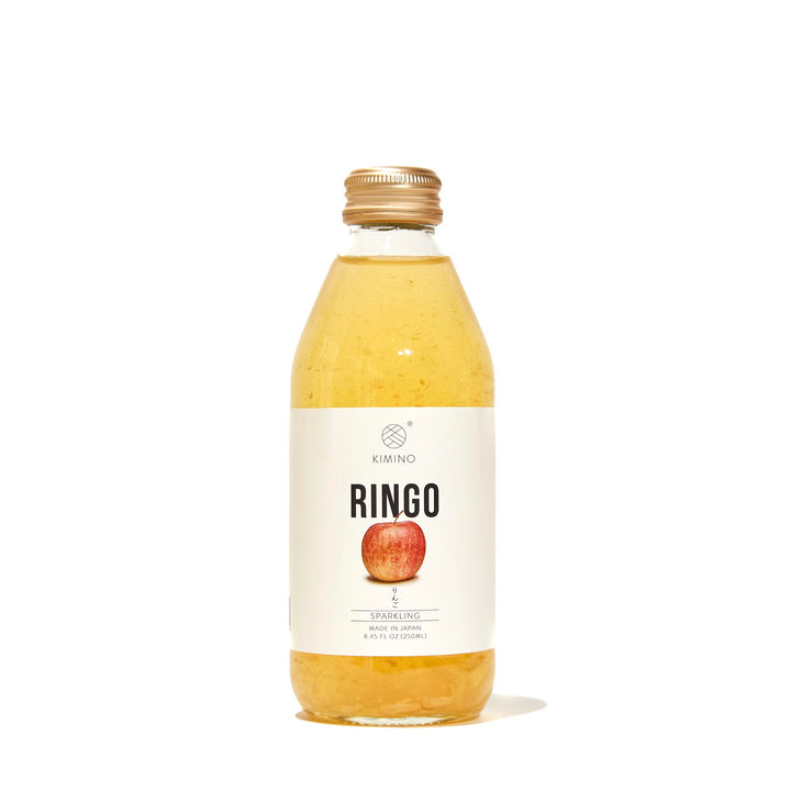 A bottle of Kimino Sparkling Juice: Ringo Apple on a white background.