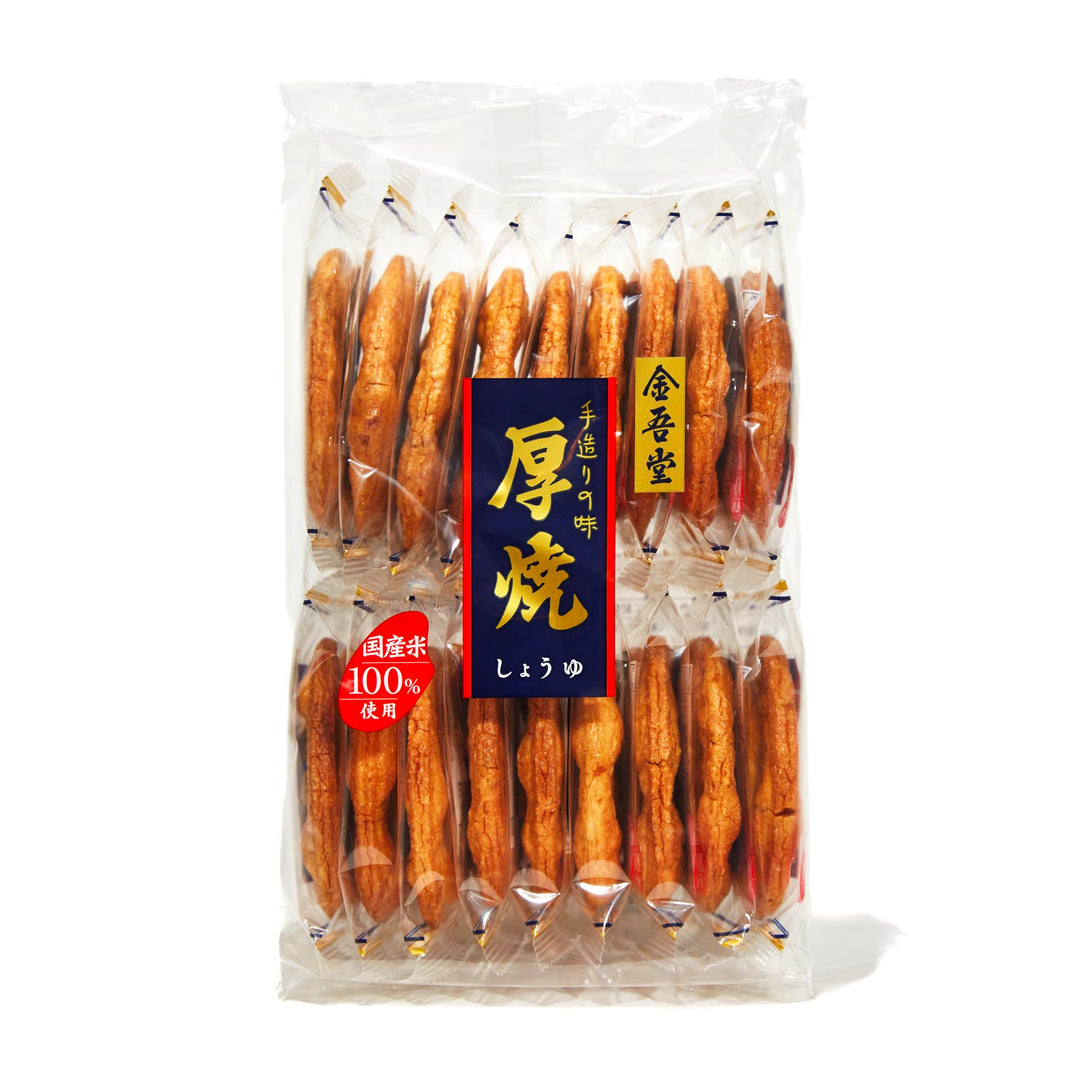 A bag of Kingodo Atsuyaki Baked Rice Crackers: Soy Sauce (18 crackers) with Chinese writing on it.