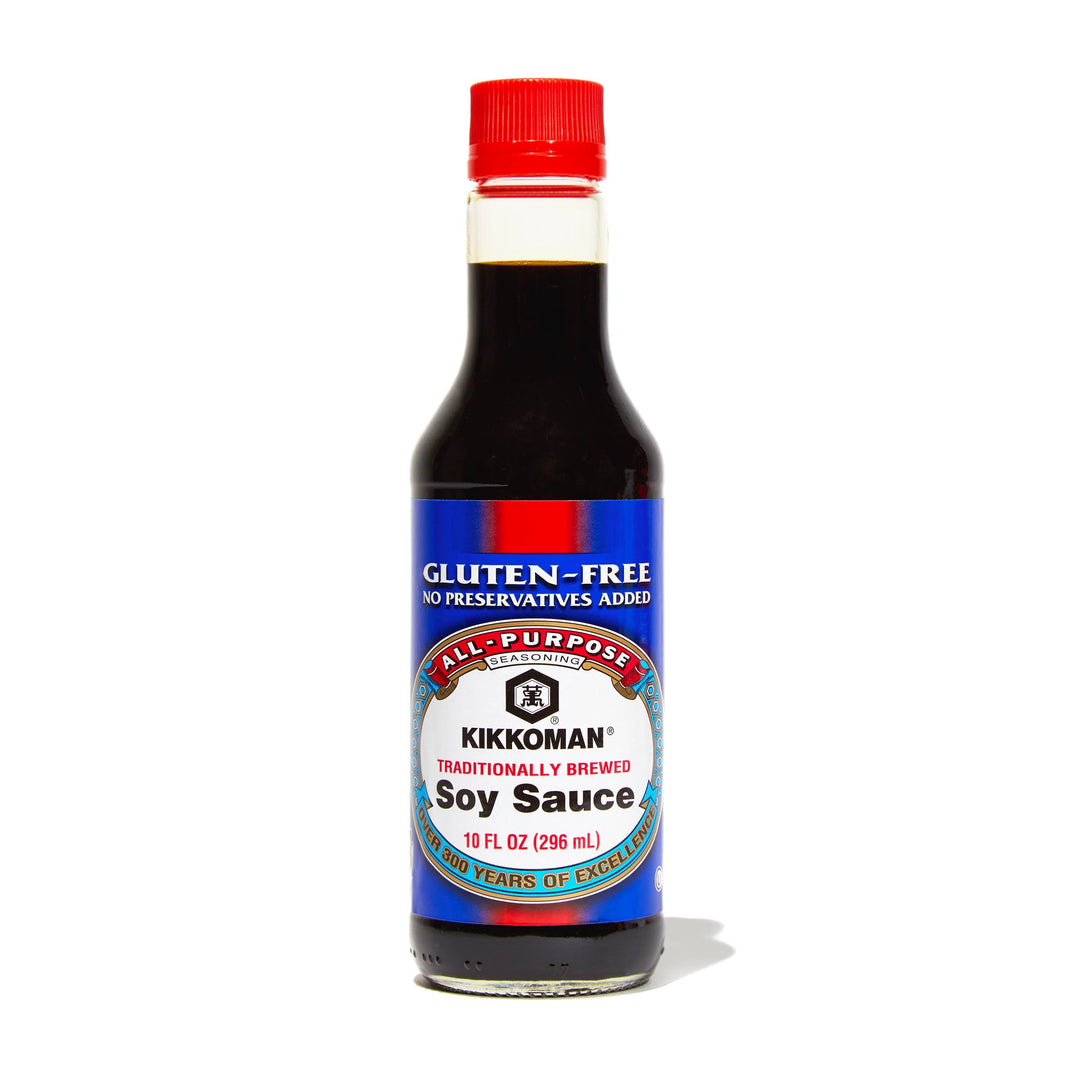 A bottle of Kikkoman Gluten-Free Soy Sauce on a white background.