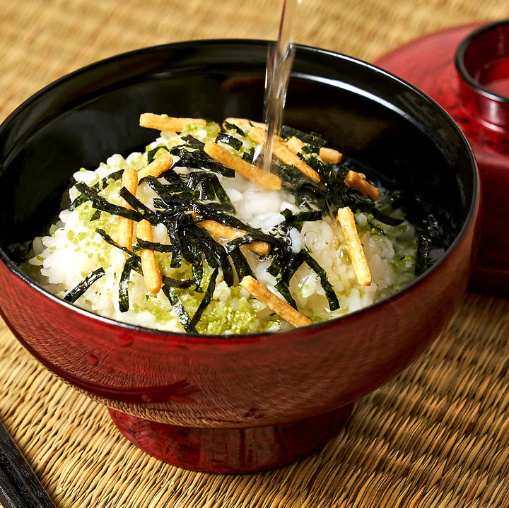 A bowl of Nagatanien Ochazuke Rice Seasoning: Seaweed (4 servings) with a spoon being poured over it.