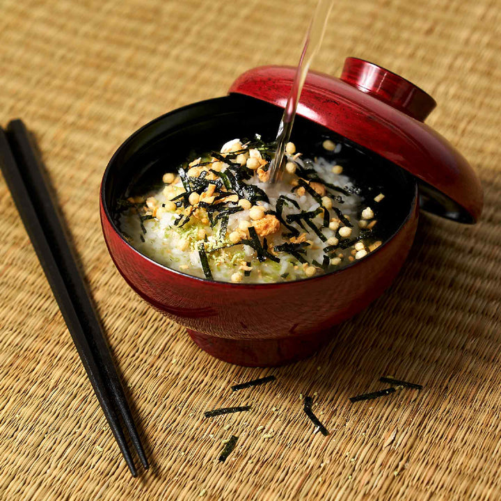 A bowl of food with Nagatanien Ochazuke Rice Seasoning: Salmon (6 servings) and chopsticks.