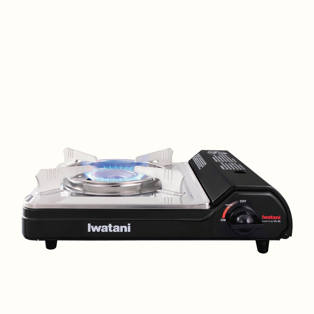 Iwatani Portable Butane Stove with Flame on and Magnetic Locking System.