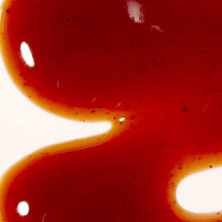 A close up of Bulldog Tonkatsu Sauce on a white surface.