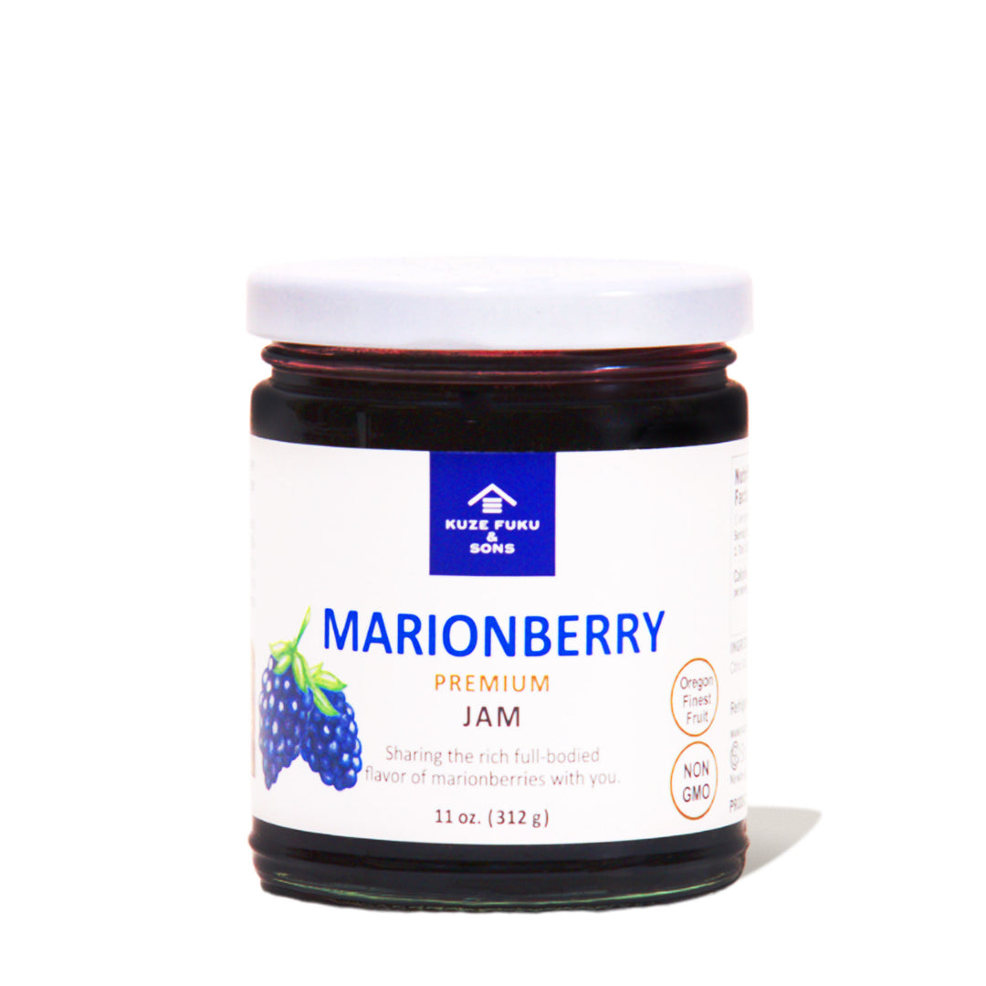 A jar of Kuze Fuku marionberry jam on a white background.