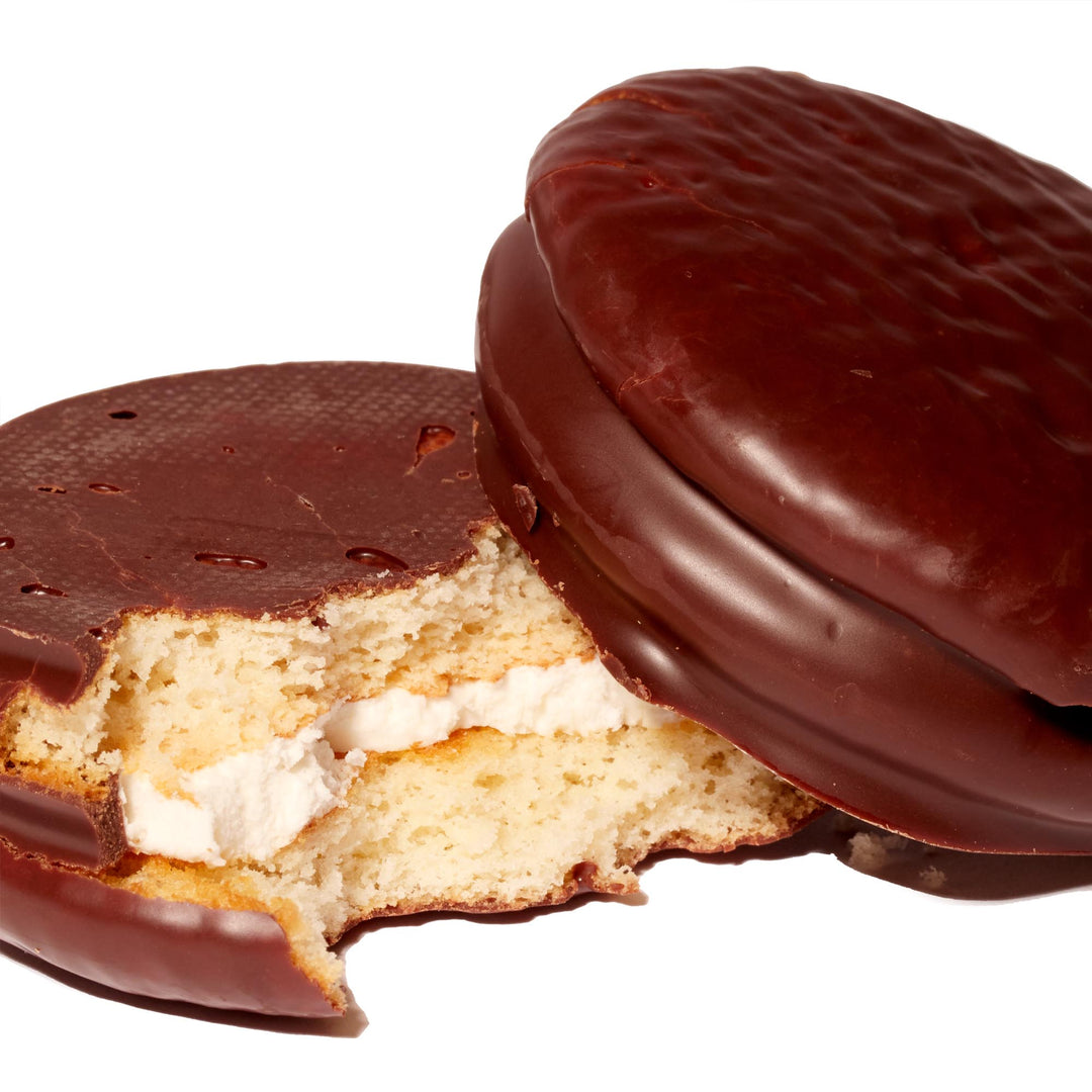 A Lotte Choco Pie with a bite taken out of it.
