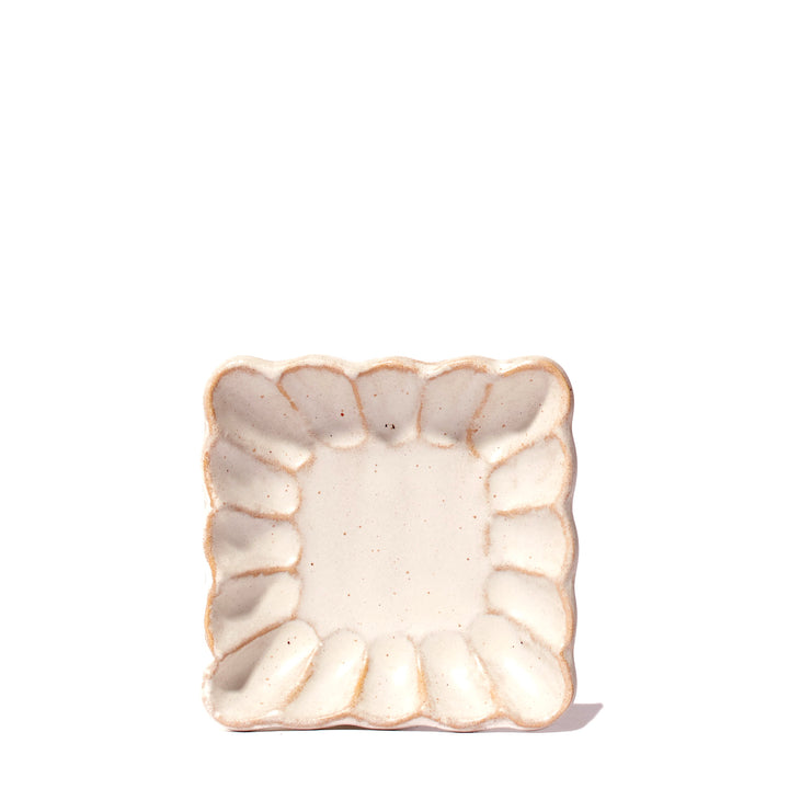 A small Kikka Kobiki Ivory Square Dish with a floral design on it. (Brand: MTC)