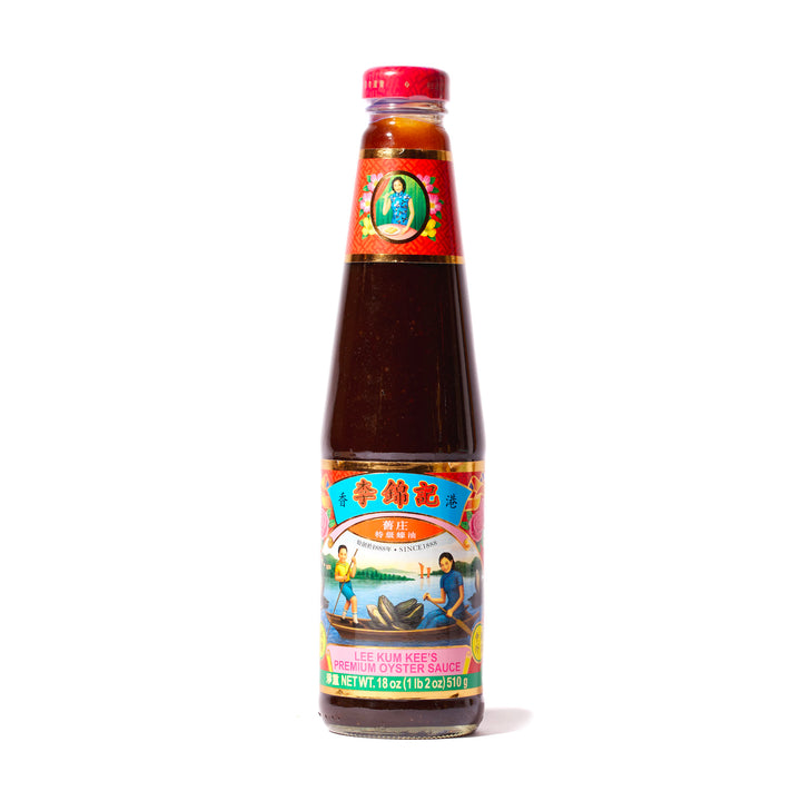 A bottle of Lee Kum Kee Premium Oyster Sauce on a white background.